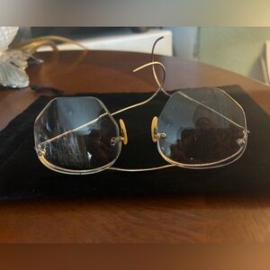 Antique rimless glasses gold filled rims. Very good condition.